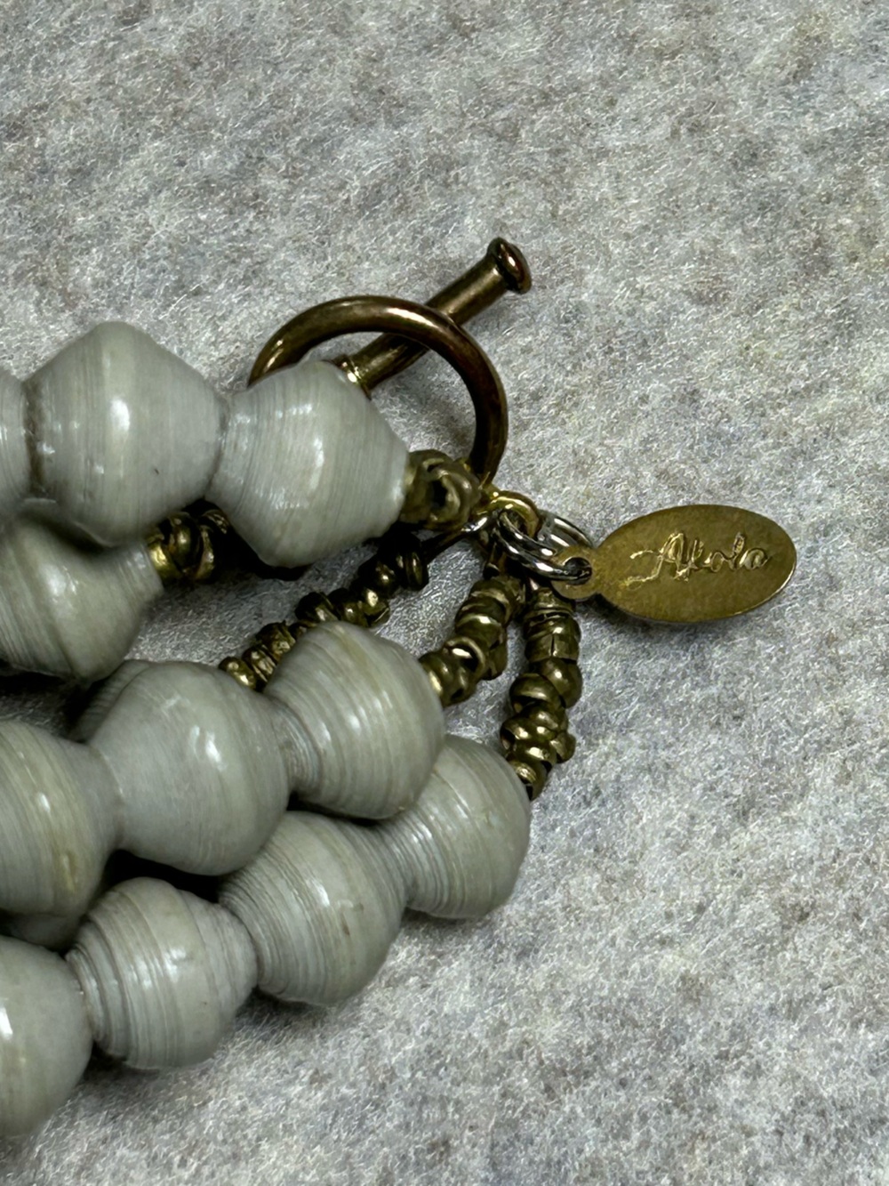 Akola Triple-Strand Gray Beaded Necklace with Bronze Cross Pendant - Picture 4 of 4